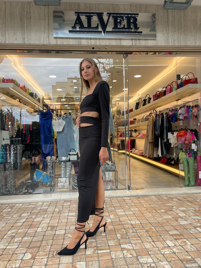 Completo nero a maniche lunghe cut out con gonna lunga