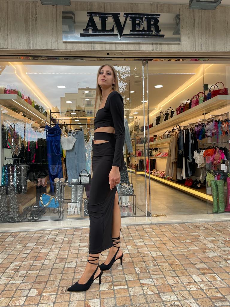 Completo nero a maniche lunghe cut out con gonna lunga