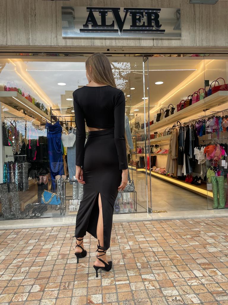Completo nero a maniche lunghe cut out con gonna lunga