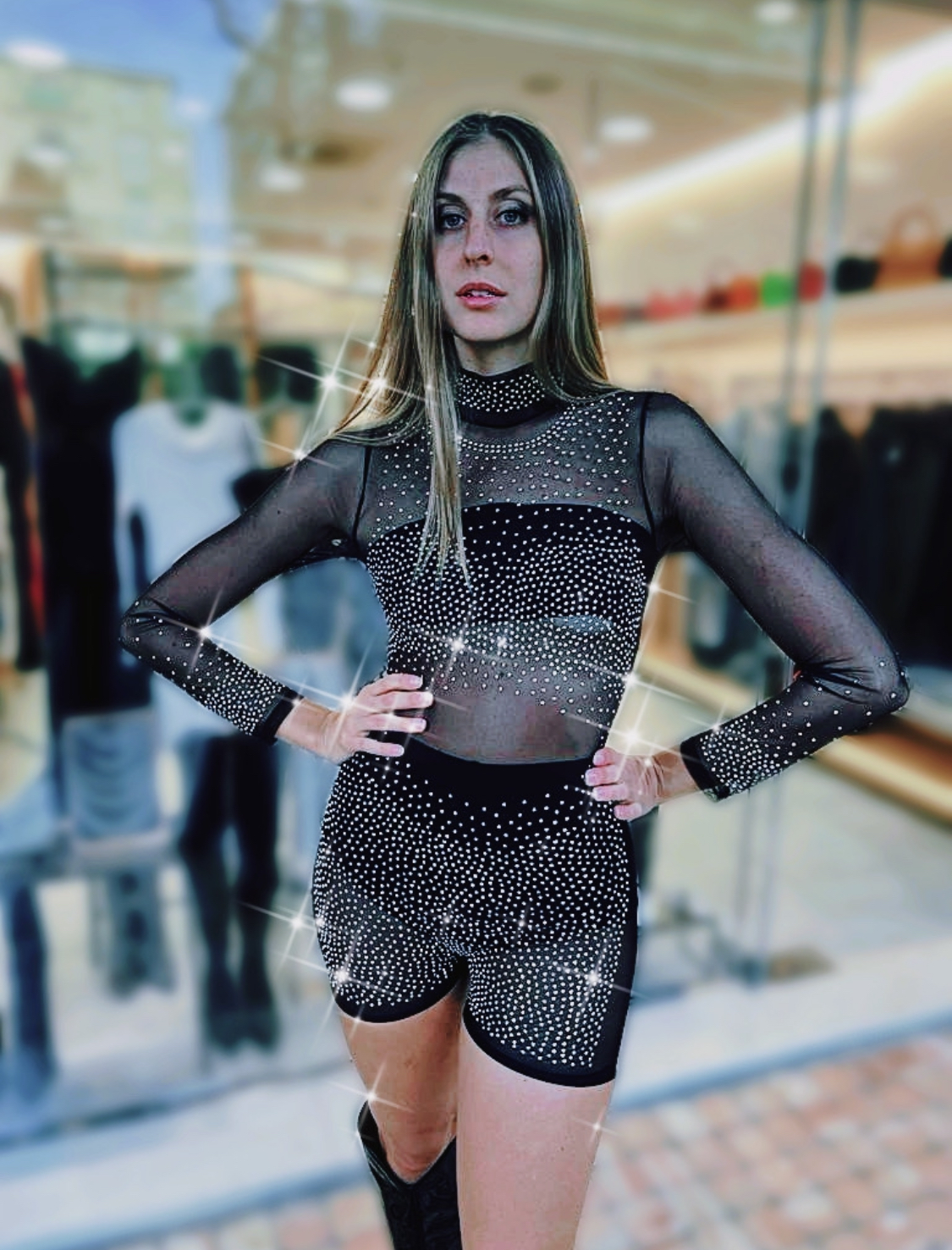 Tutina trasparente nera a maniche lunghe con borchiette
