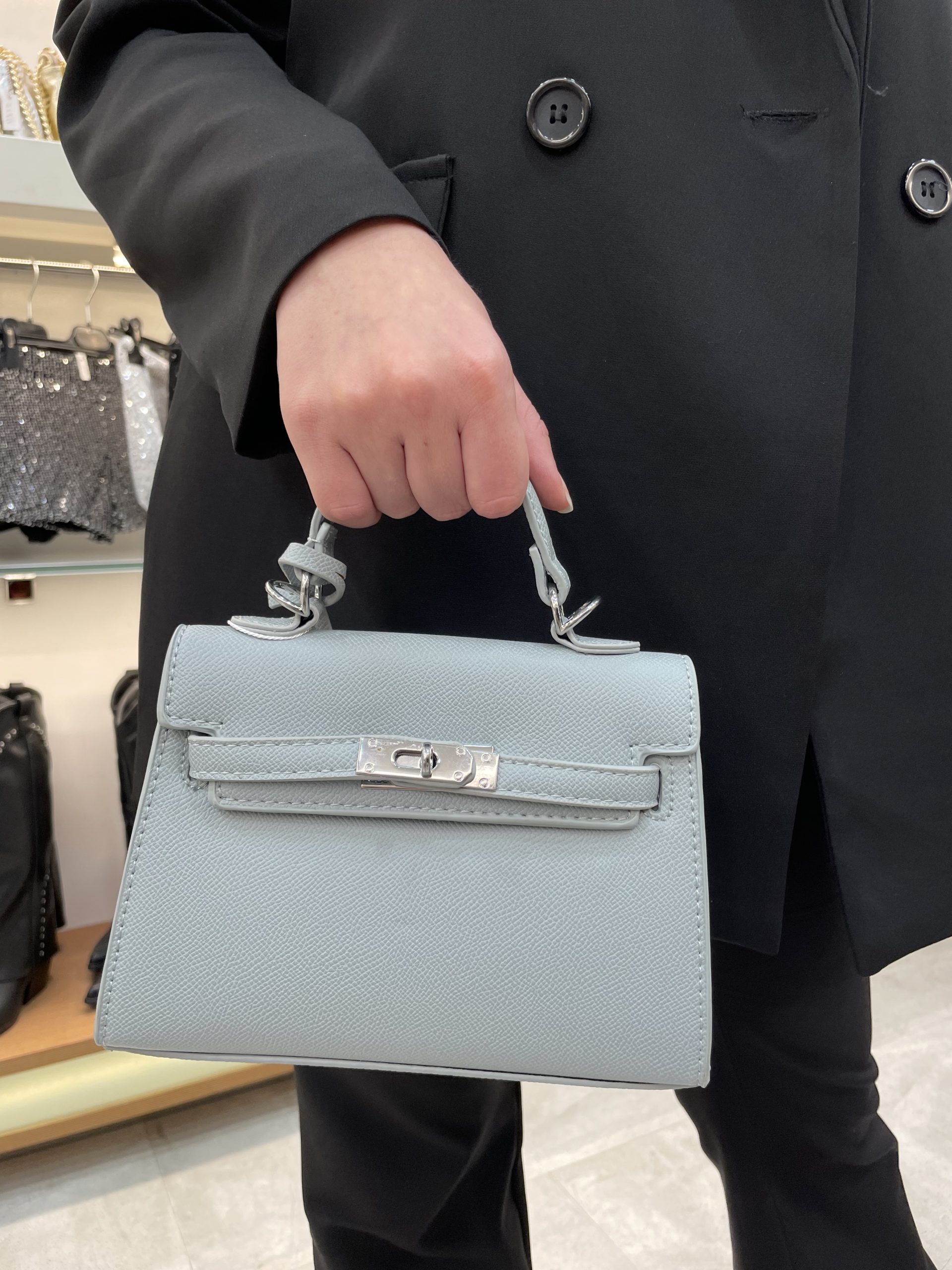 Borsa mini chiusura gancio in ecopelle grigia
