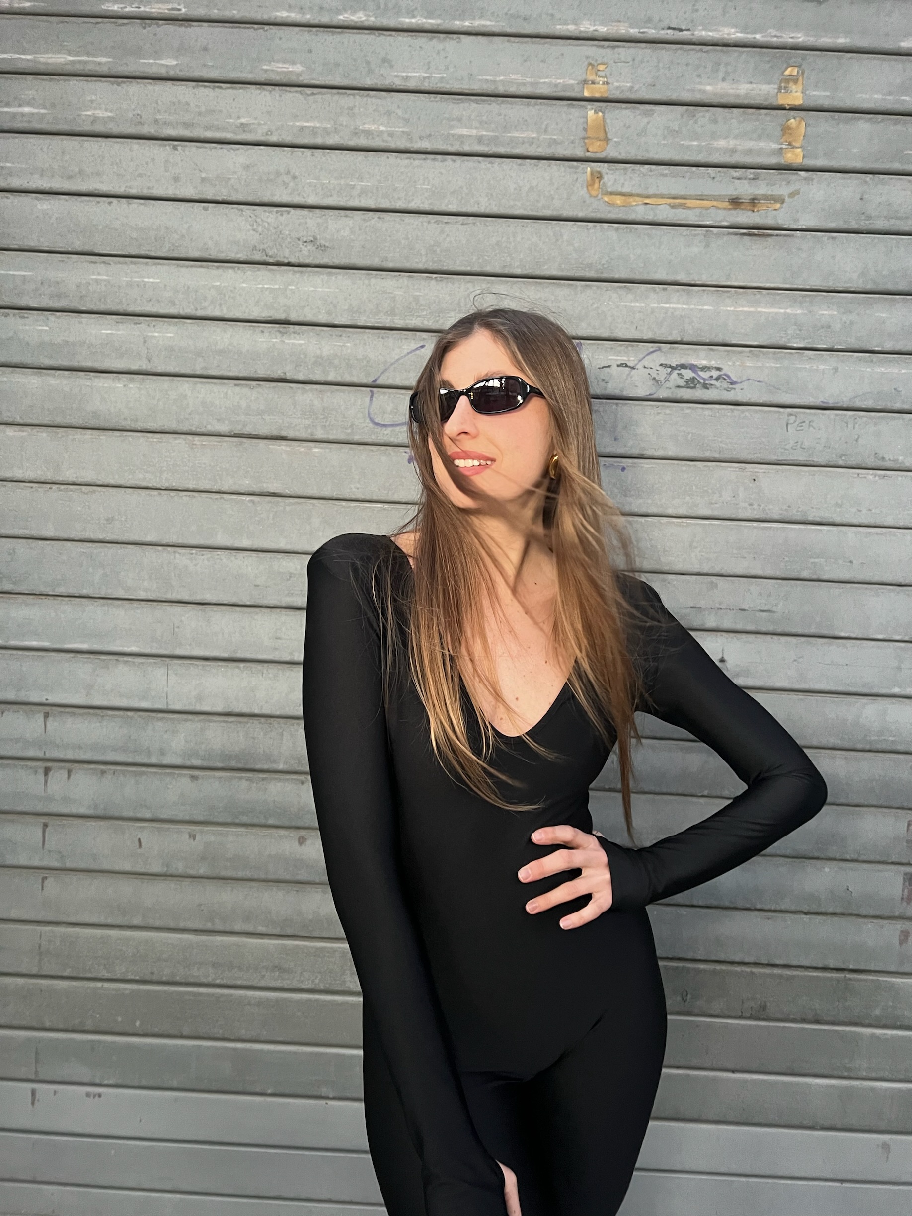 Tuta lunga nera aderente in lycra