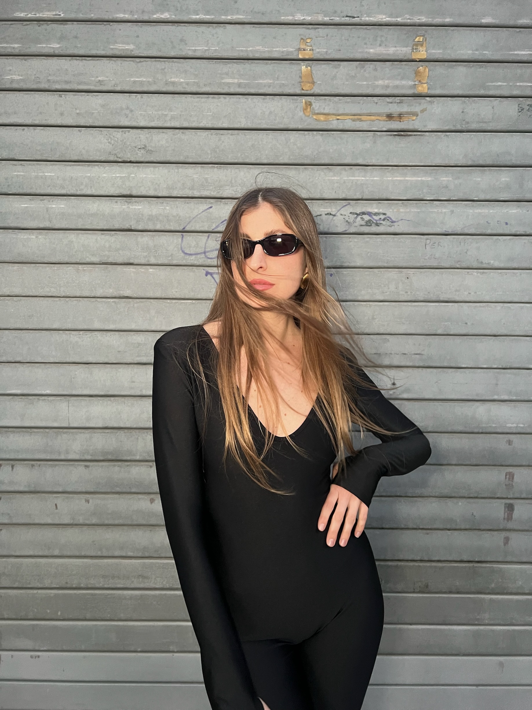 Tuta lunga nera aderente in lycra