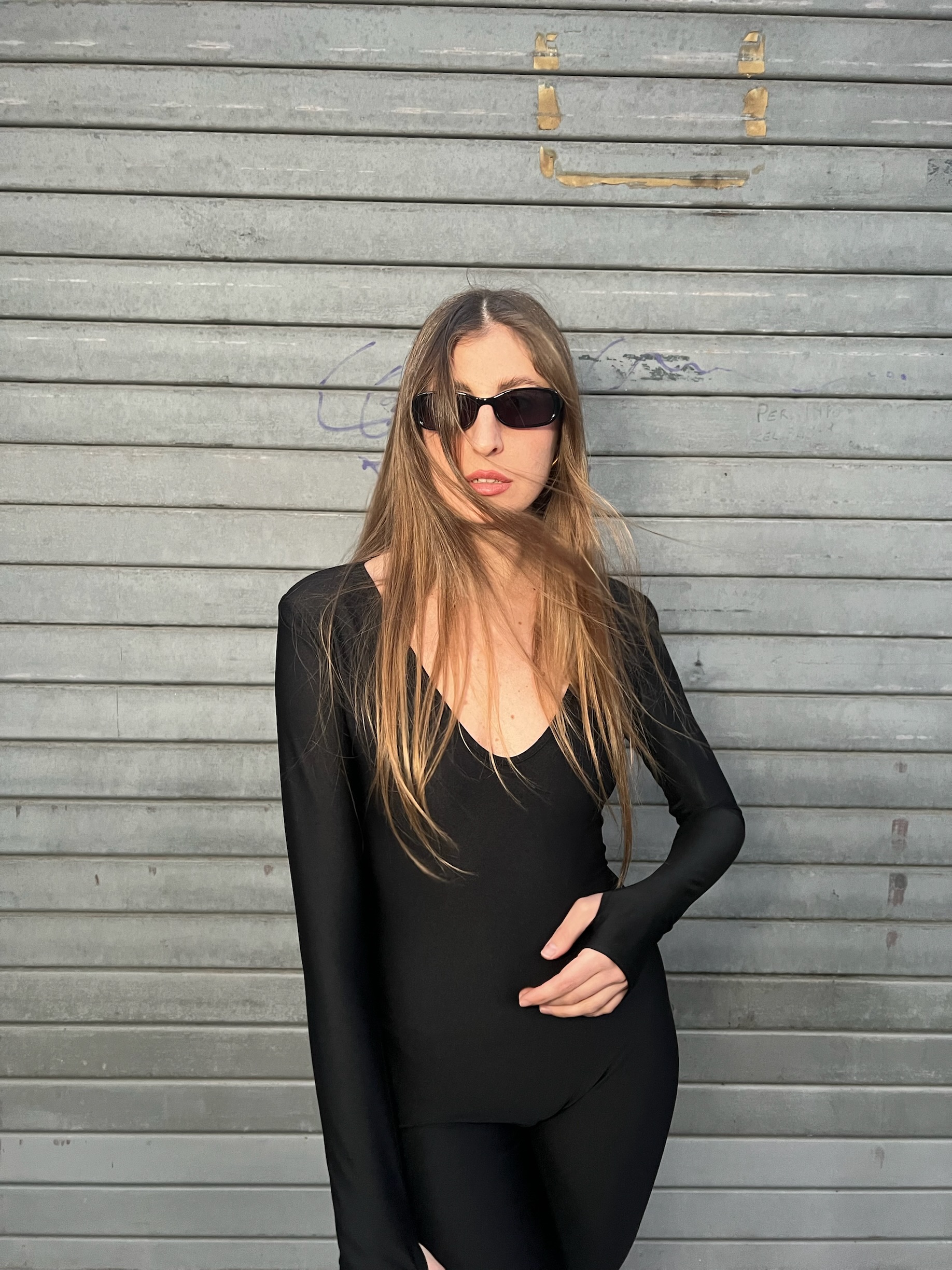 Tuta lunga nera aderente in lycra