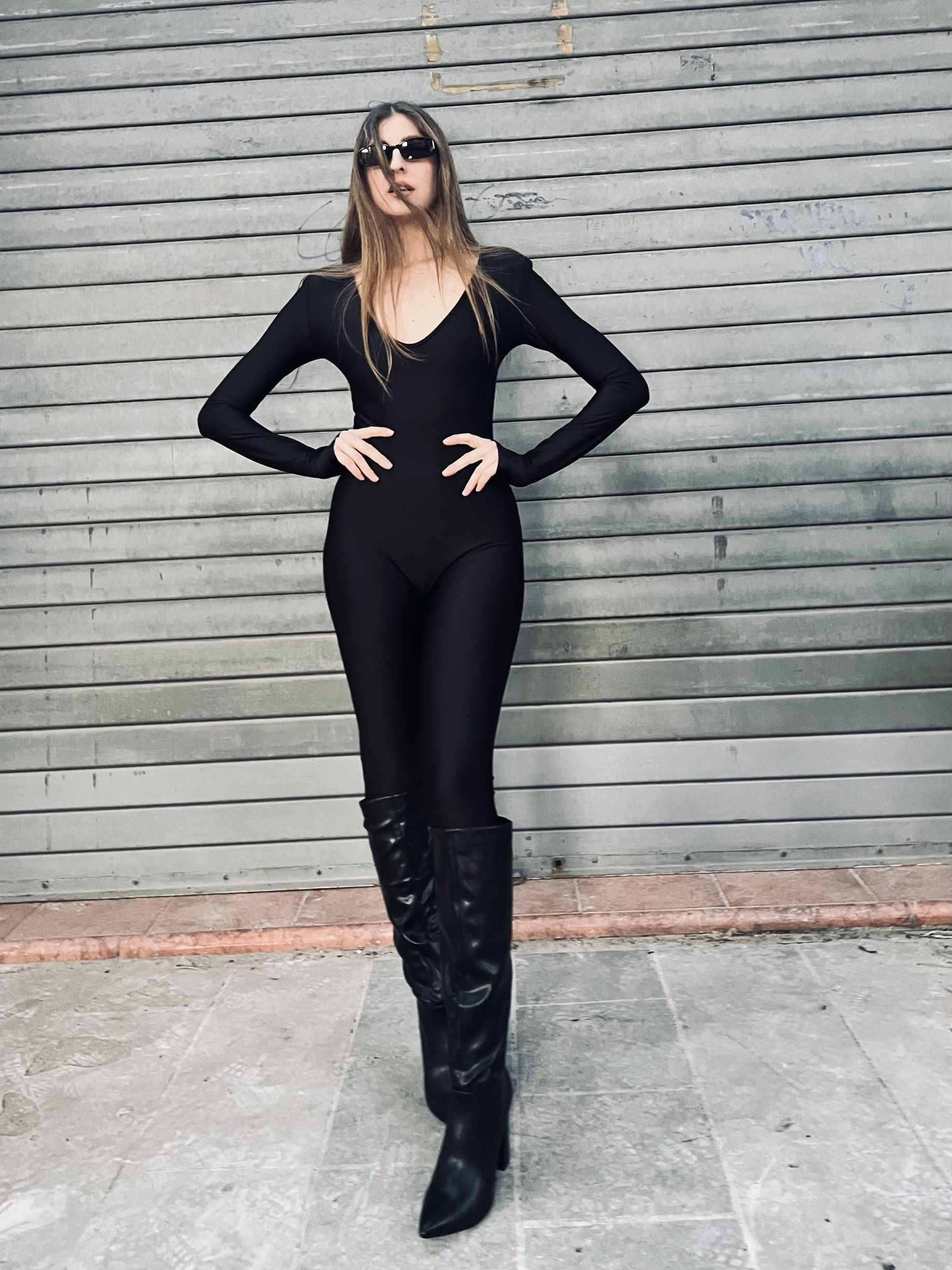 Tuta lunga nera aderente in lycra