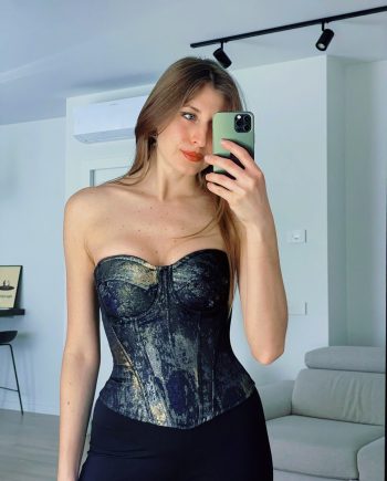 Top a bustino blu con glitter oro